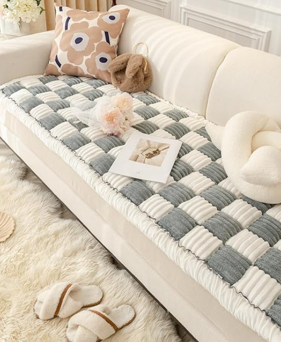 Washable couch cover for pet owners helps reduce pet hair, pet odor, and furniture stains in a small apartment